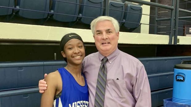Purvis star Elise Jackson, coach Michael Thornton and the Tornadoes moved to the second round with a win over Bay High Monday night. (Feature photo courtesy Purvis Athletics)