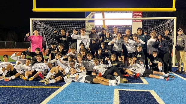 The New Hope Trojans celebrate their 5A North State Championship after defeating Ridgeland High 2-1 Tuesday night in Ridgeland. (Photo courtesy New Hope Soccer)
