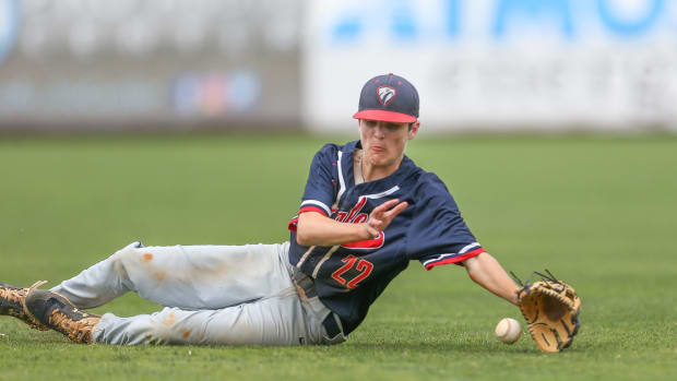 Tupelo Christian's Logan White (22) attempts to field a ground ball at second. Tupelo Christian and Resurrection played in game 2 of the MHSAA Class 1A Baseball Championship on Thursday, June 3, 2021 at Trustmark Park. Photo by Keith Warren