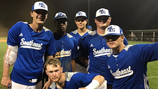Members of the 2021 Southeast Lauderdale baseball team celebrate a win.