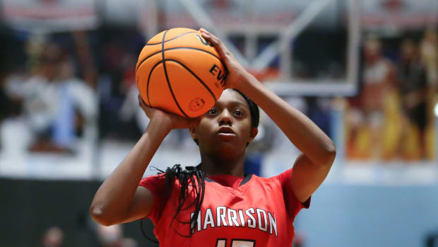 Harrison Central's Anaisha Carriere (15) puts up a shot. Germantown and Harrison Central played in an MHSAA Class 6A basketball semifinal basketball game at Mississippi Coliseum on Wednesday, March 3, 2020. Photo by Keith Warren