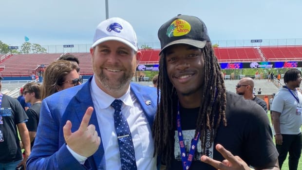 Gulf Shores tailback Ronnie Royal poses for a photo with South Alabama head coach Kane Wommack during an official visit to USA.