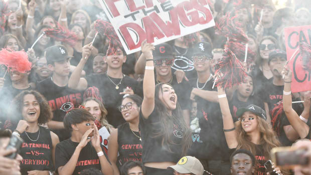 Corona Centennial fans cheer for their team in a 43-20 loss to the Mater Dei Monarchs on September 3, 2022.