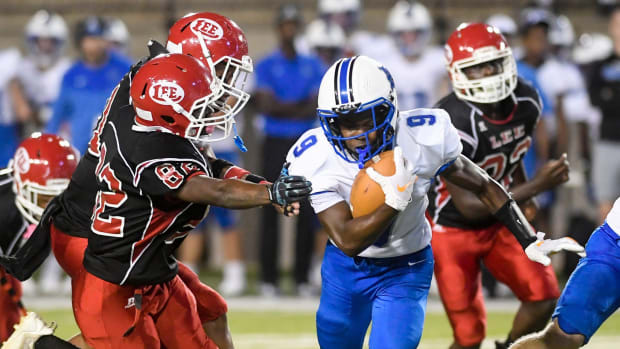 Auburn High School s Ean Nation (9) carries against Lee during their game at Cramton Bowl in Montgomery, Ala., on Thursday September 15, 2022.