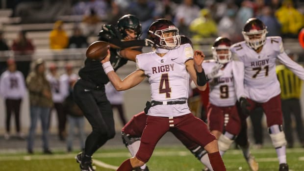 Luke Flowers threw four touchdowns passes to propel defending Class 5A champion Rigby past Eagle, 37-6, in the state quarterfinals on November 4, 2022 in Eagle, Idaho.