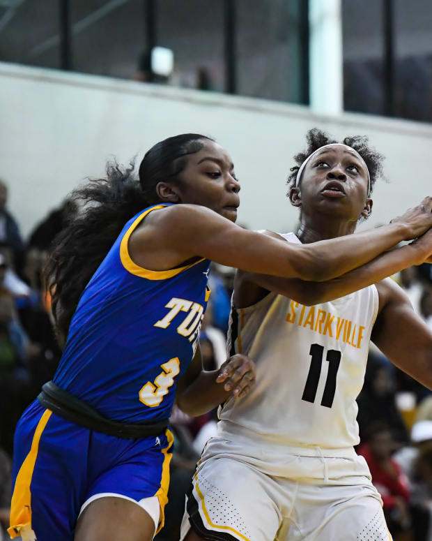 Mississippi girls high school basketball - The Starkville Lady Jackets beat back a fierce Tupelo rally to survive against Tupelo 59-58 on January 20, 2023.