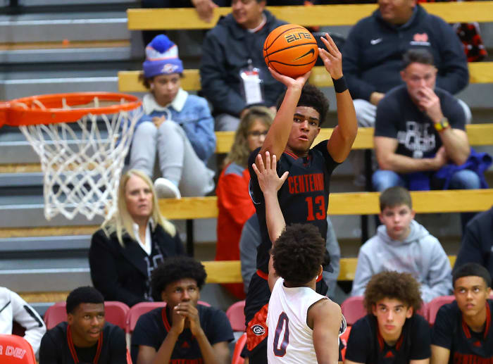Eric Freeny, Centennial, burned all night with seven 3-pointers and 34 points.  Photo: Nick Koza. 