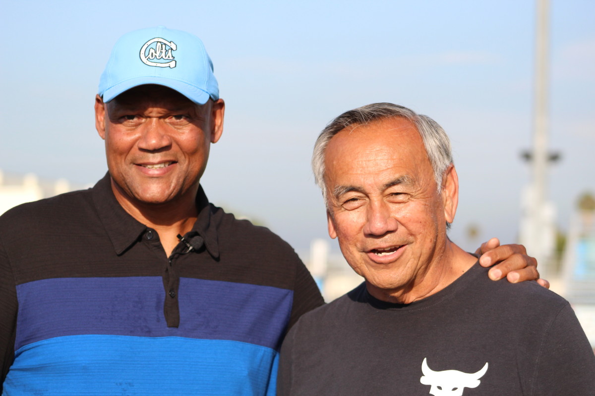Mike Wilson (left) and Norm Chow.