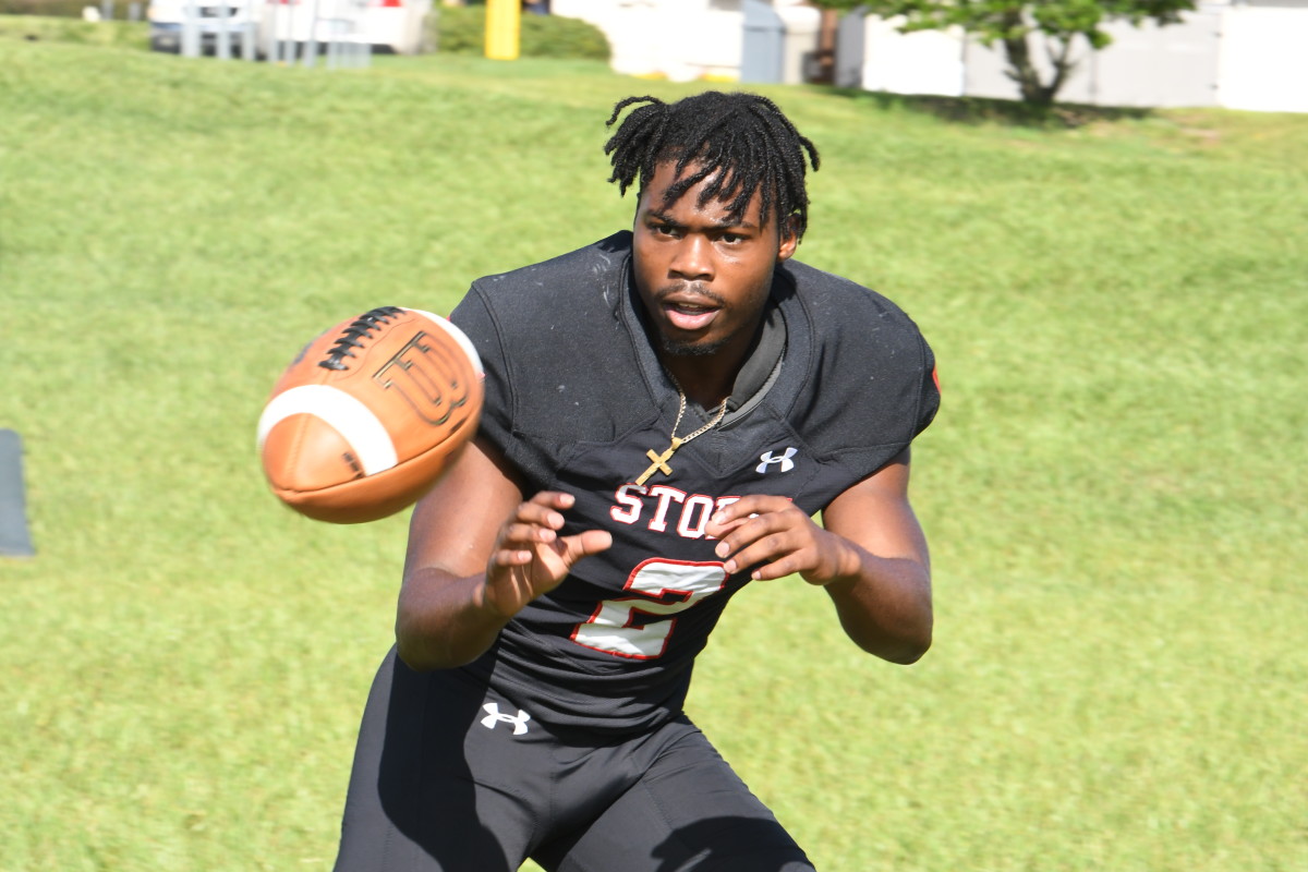 Victory Christian running back Rashad Orr Jr. (2) takes a pitch during the Storms media day in Lakeland.